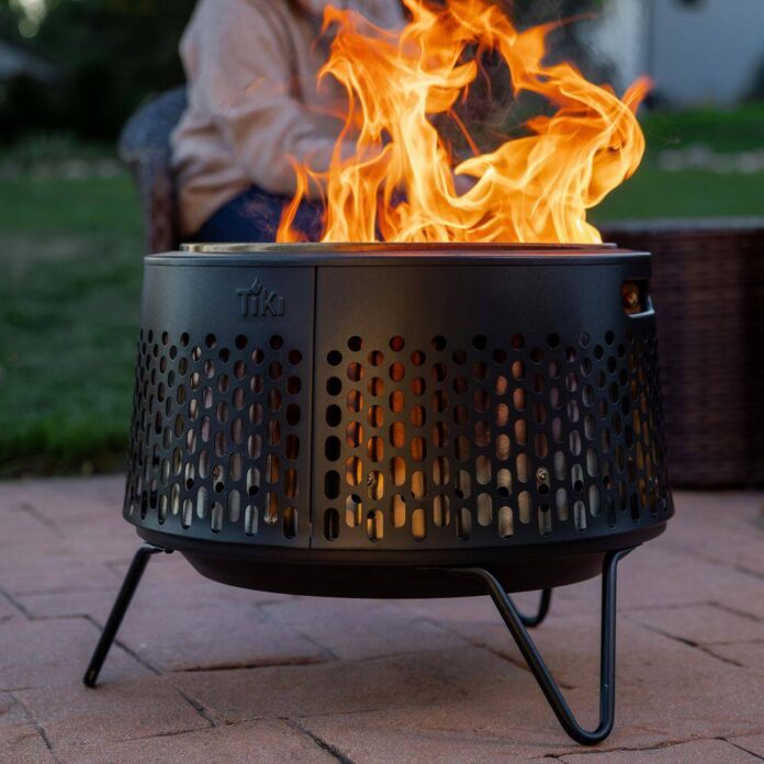 TIKI Brand Huddle Fire Pit Burning