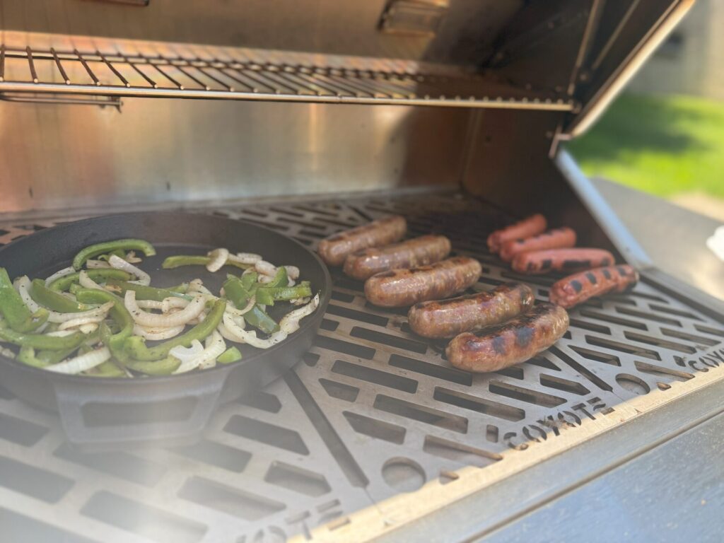 Coyote Outdoor Pellet Grill - Sausage and Peppers